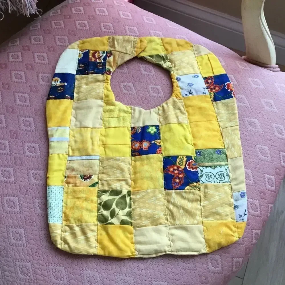 3/$25 or $12 ea. NWT Reversible Baby Bib in Yellows